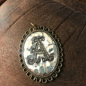 “A” monogram pendant
